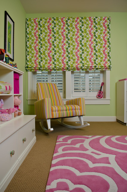 Фотография дизайна детской комнаты для девочки.